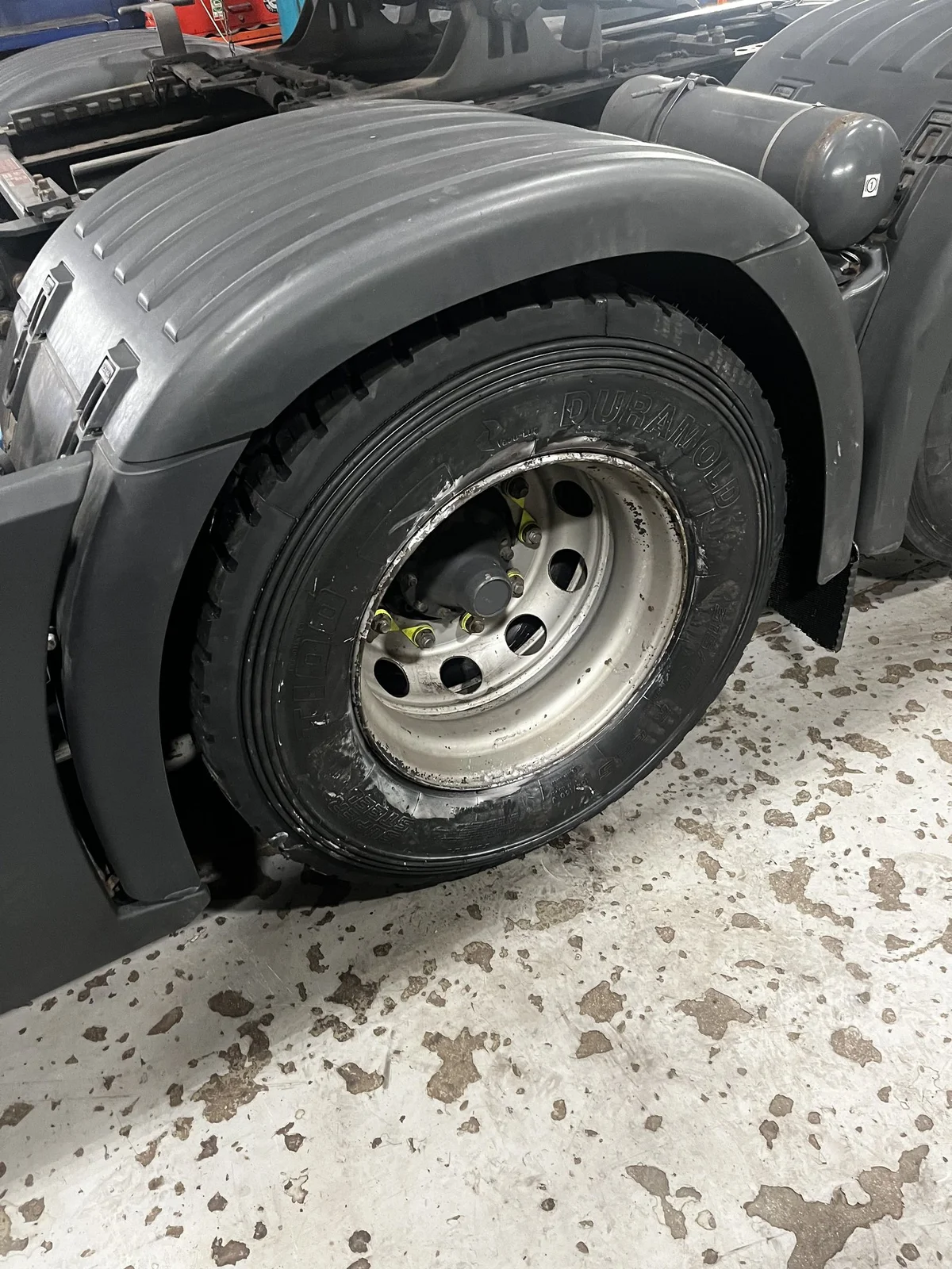 Truck tyre being replaced